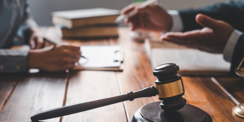 attorneys having a conversation at a table